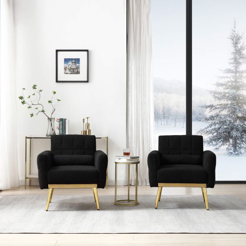 2 piece black accent chairs in a living room 