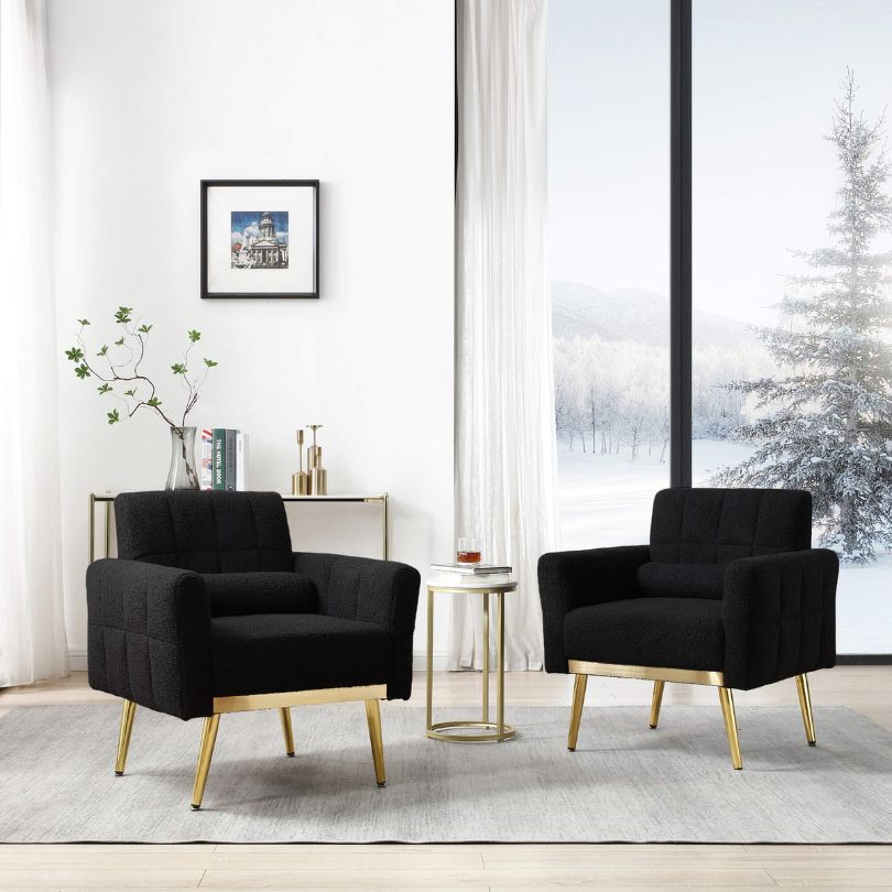 2 piece black accent chairs in a living room 