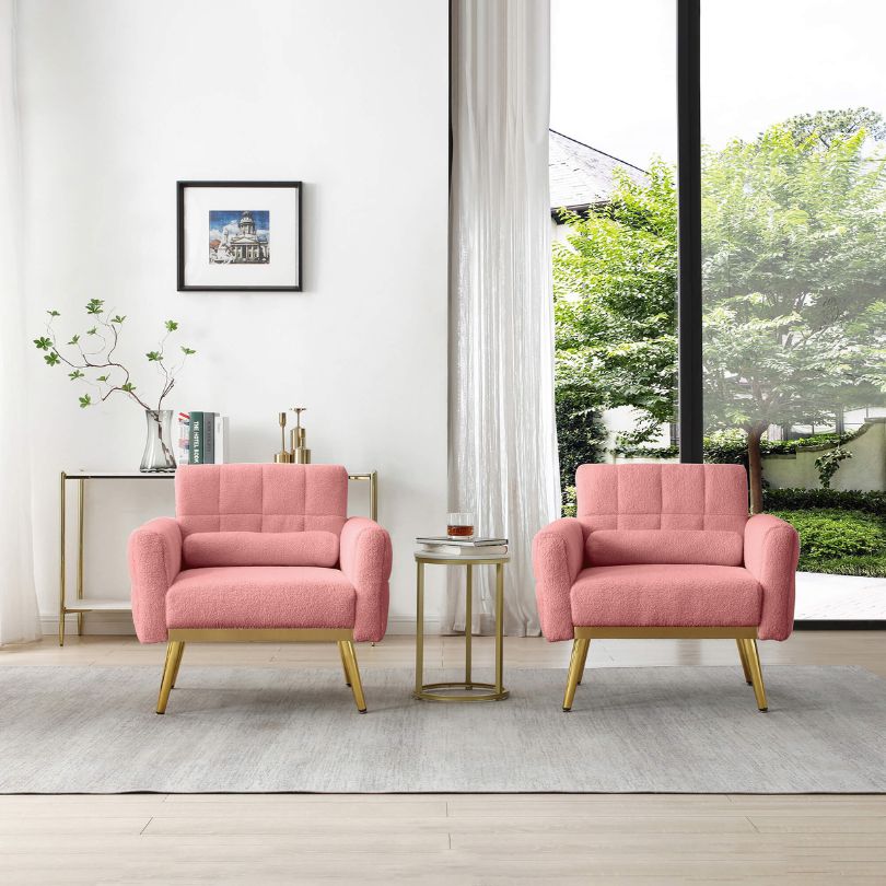 2 piece pink accent chairs in a living room 