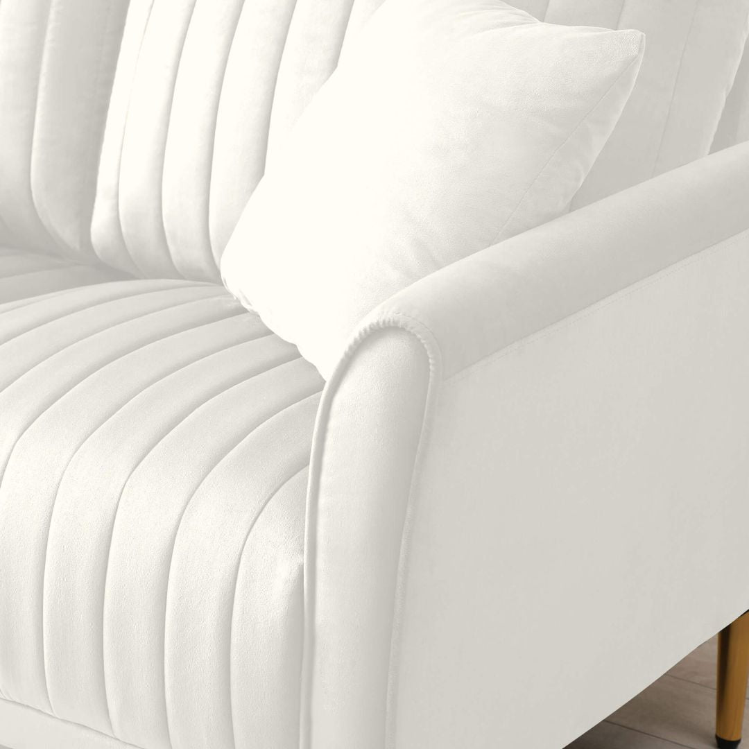 tufted white sofa